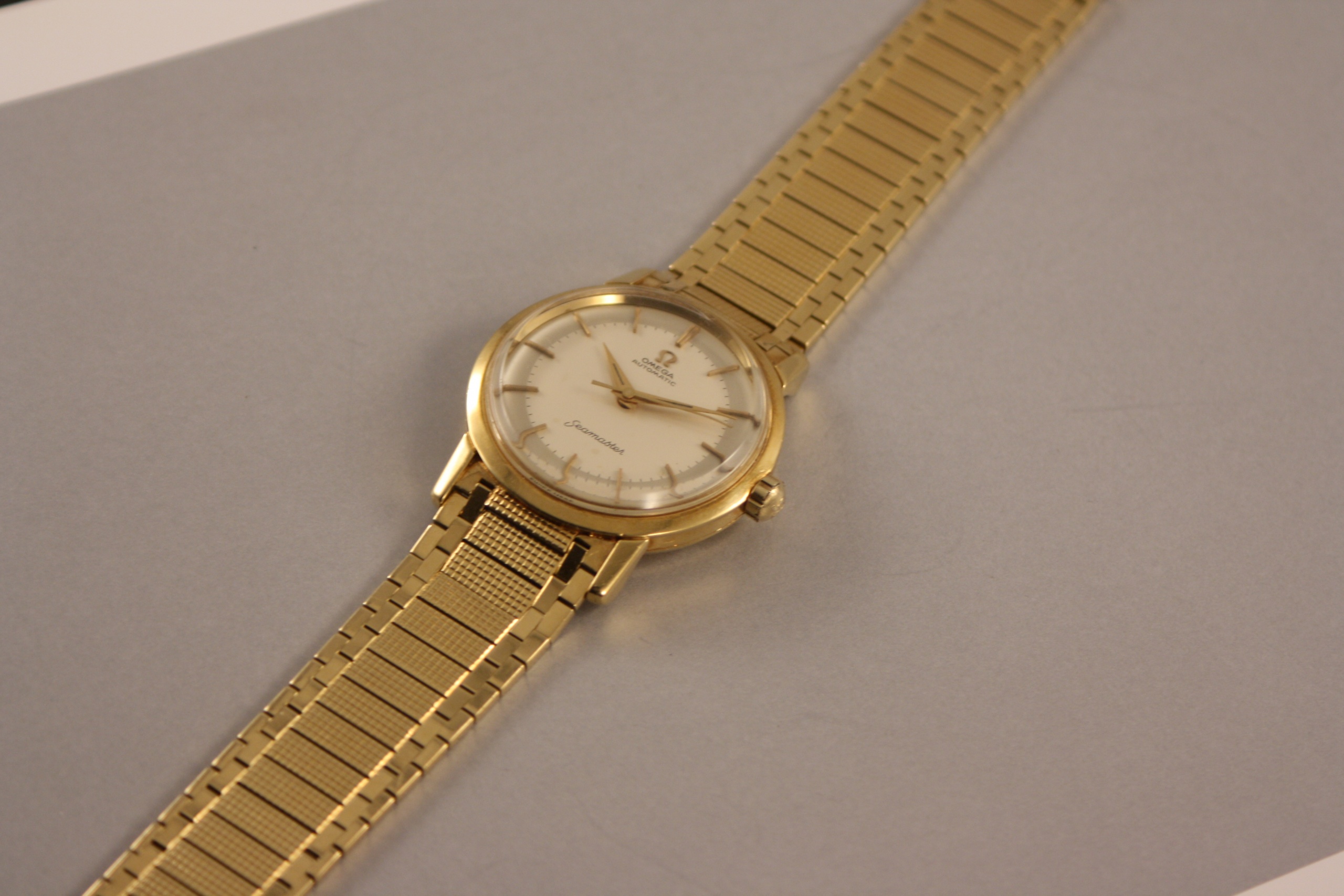 Rare Omega in yellow gold with integrated bracelet from the 1950's ...