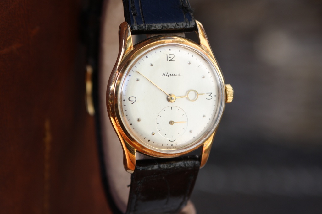 Alpina gold watch hotsell