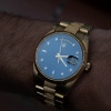 rolex day date wristshot blue dial